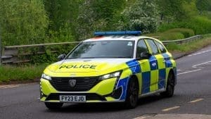 Police car on country road response