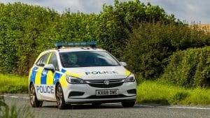 Police car on rural road