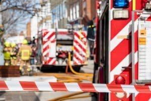 Fire engine behind cordon tape