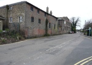 Mill Lane, Eastry, with the former hospital buildings running alongside the road